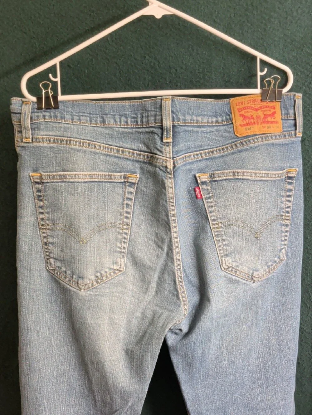 Levi's light blue denim jeans with tan leather patch